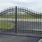 Ornamental metal fence with gate by Lovewell Fencing